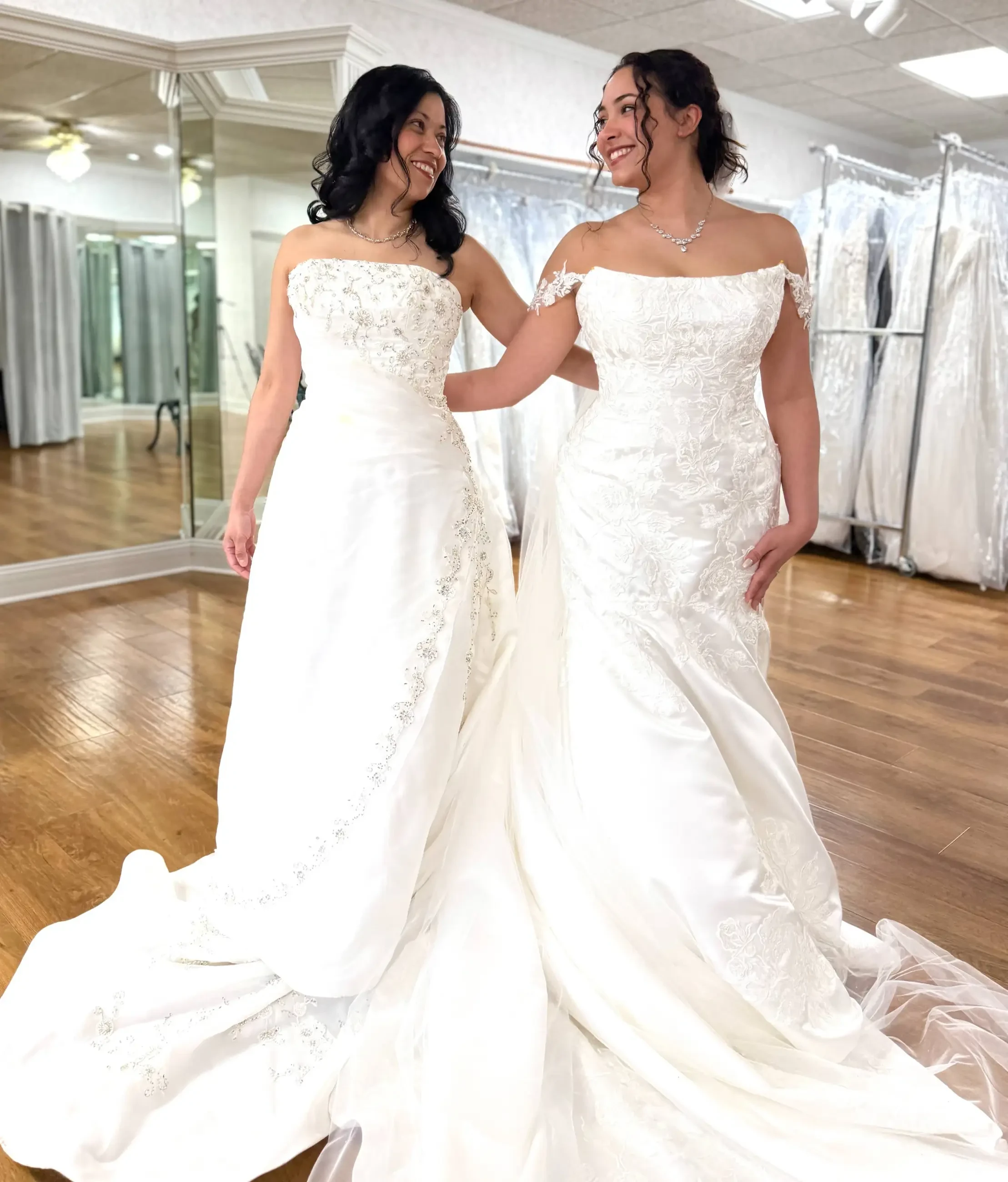 models wearing white wedding gown