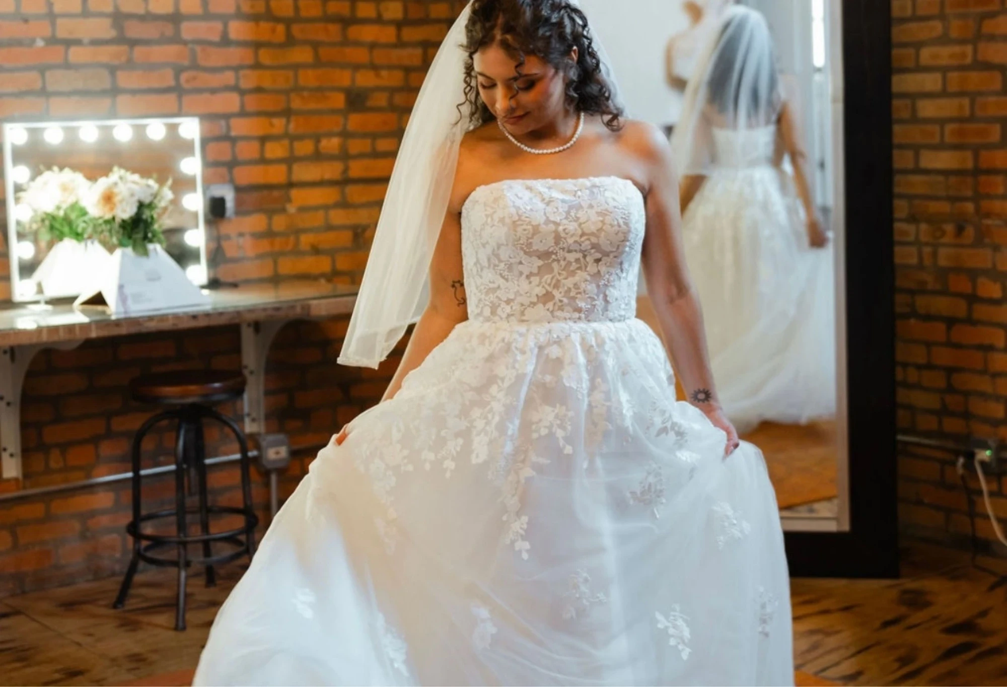 Bride twirling in a wedding dress at Elegance Wedding & Evening Wear in Highland, Indiana