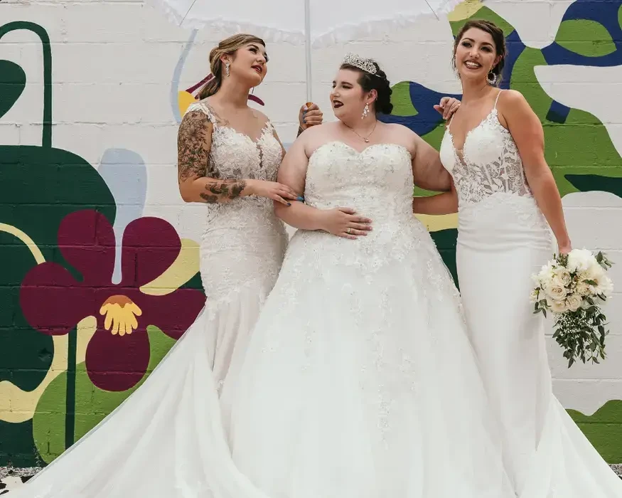 Brides wearing wedding dresses at Elegance Weddings Bridal Shop in Highland Indiana