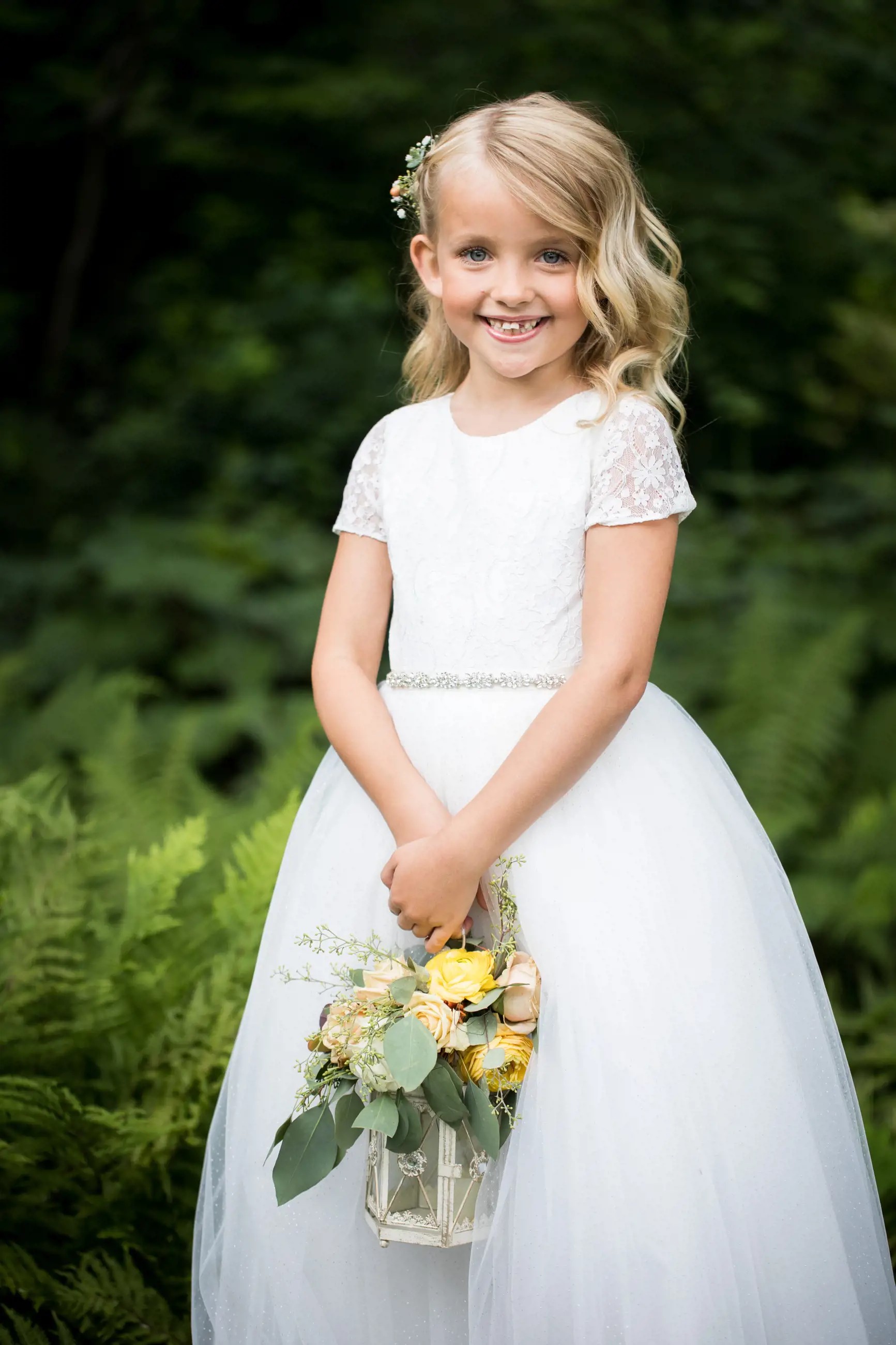 Flower girl in a light pink dress