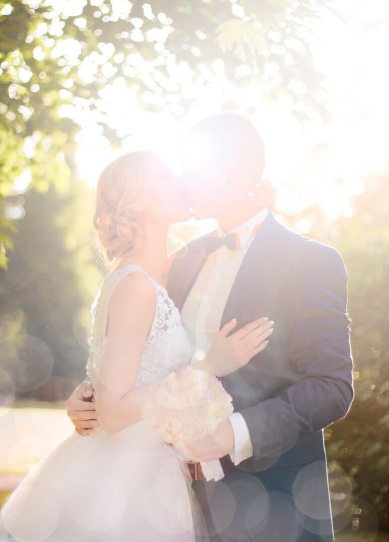 Bride and groom sharing a kiss