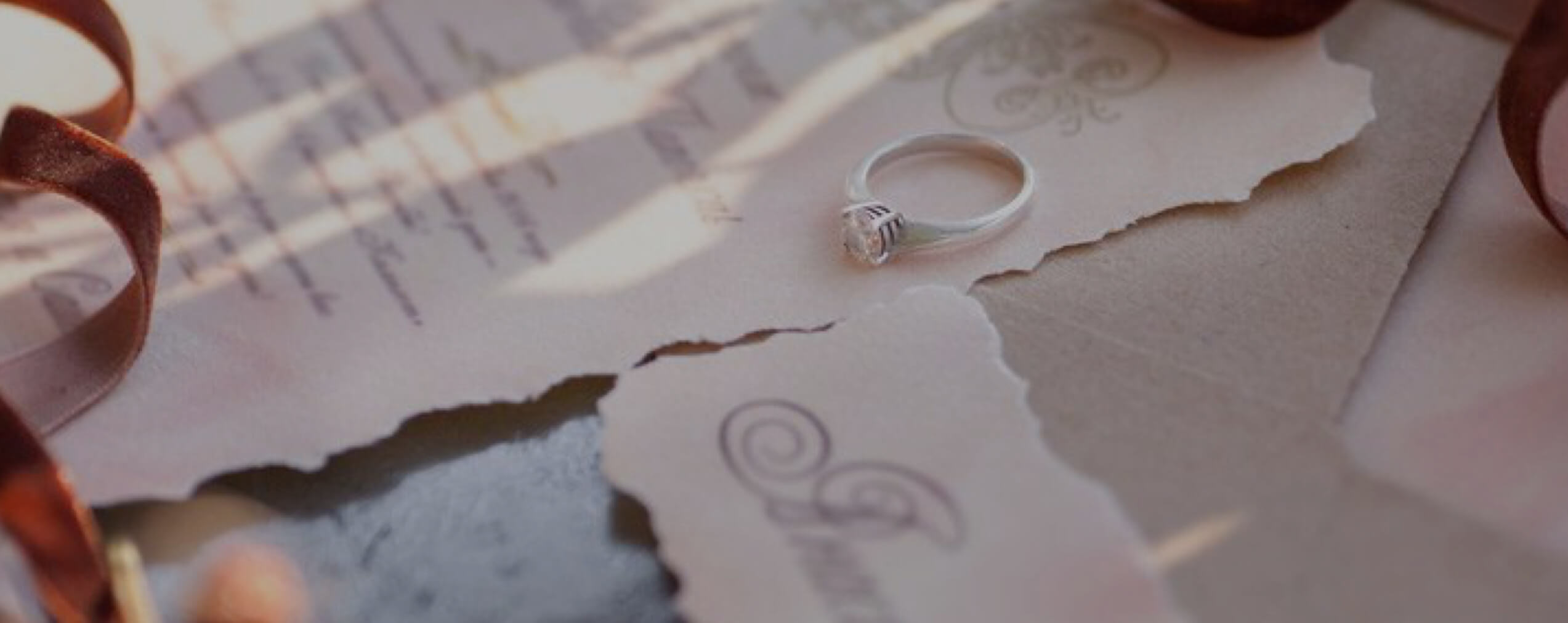 Close up image of wedding invitations shown on desktop